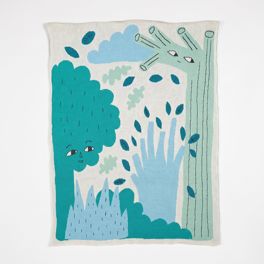 Donna Wilson Green Trees Cotton Mini Blanket studio product photo on a neutral off-white background