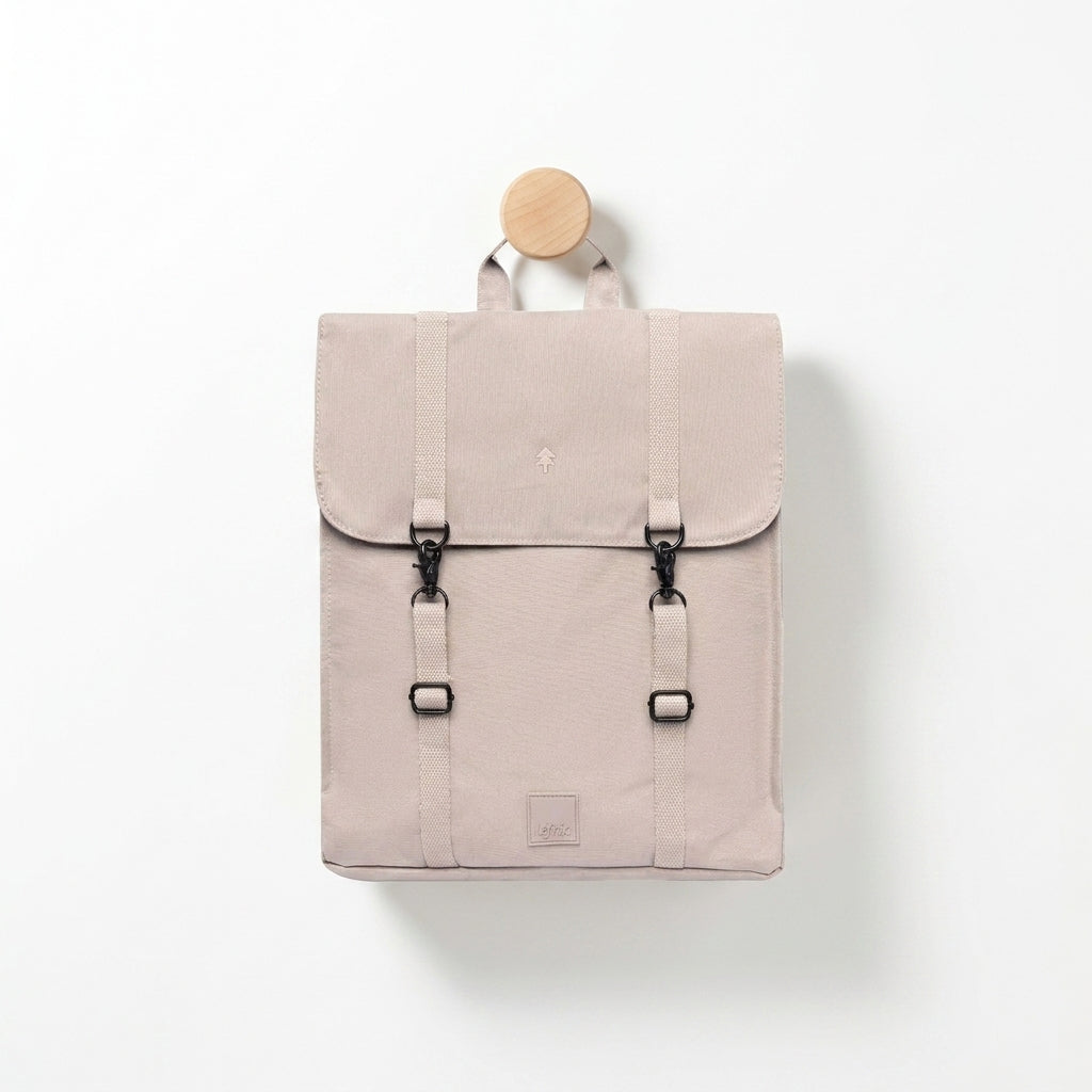 Lefrik Handy Backpack - Ash studio product photo hanging from a wooden wall hook on a neutral off-white background