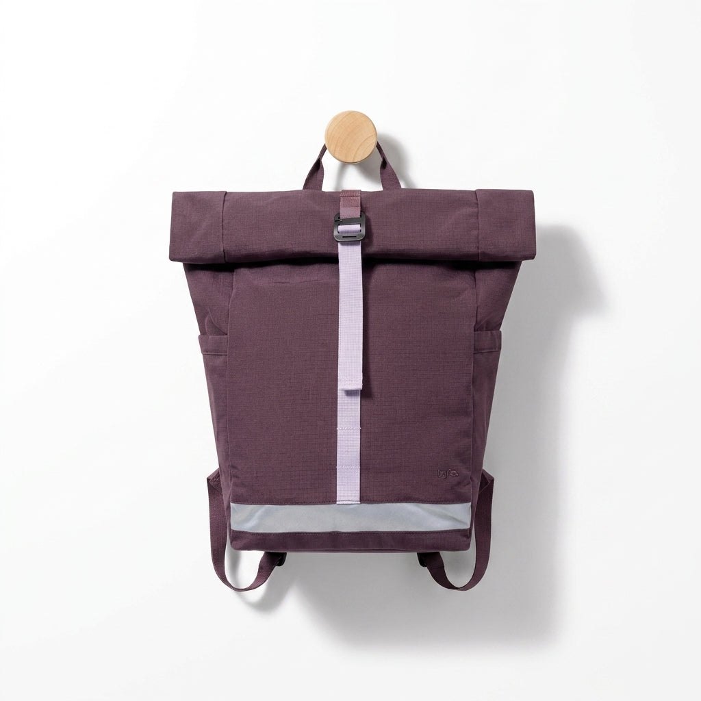Lefrik Lars Roll Backpack - Wine studio product photo hanging from a wooden wall hook on a neutral off-white background