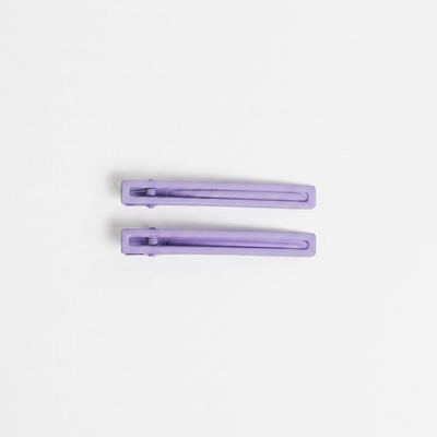 
                    
                      NAT + NOOR Leia alligator hair clips, a pair of solid lavender hair clips, flat lay on white.
                    
                  