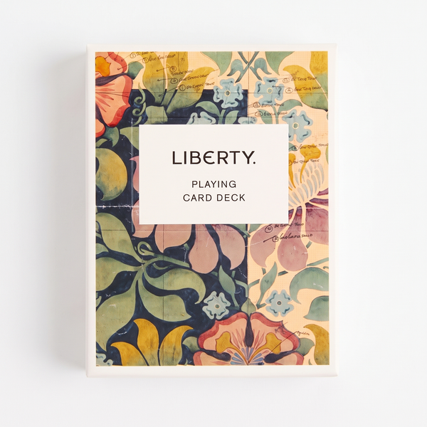 Liberty Archive Playing Card Deck, archival floral design in blue, green, pink, yellow, with hand-drawn notes, front view on…