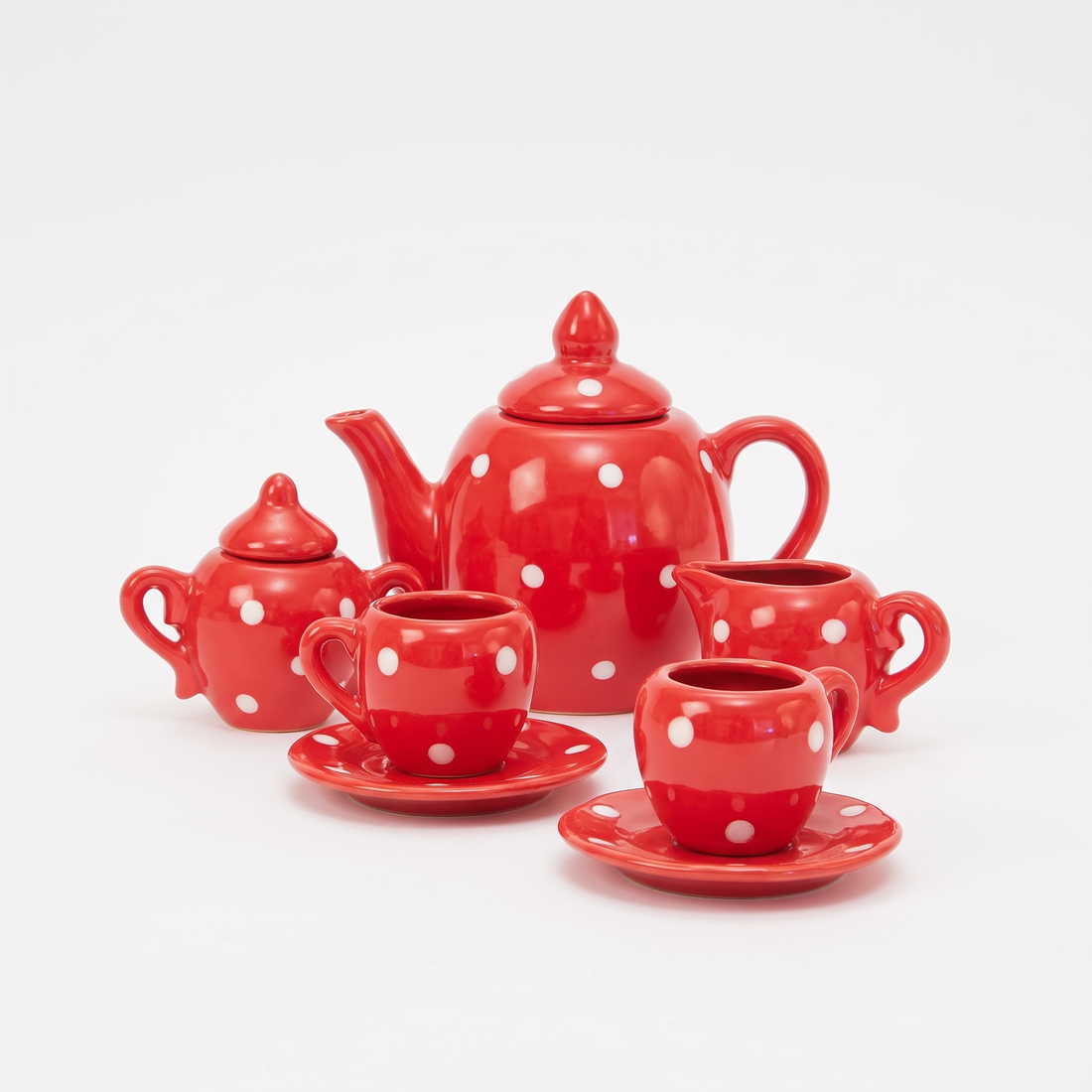 Moulin Roty Ceramic Tea Set in Suitcase - The Big Family studio product photo on a neutral off-white background