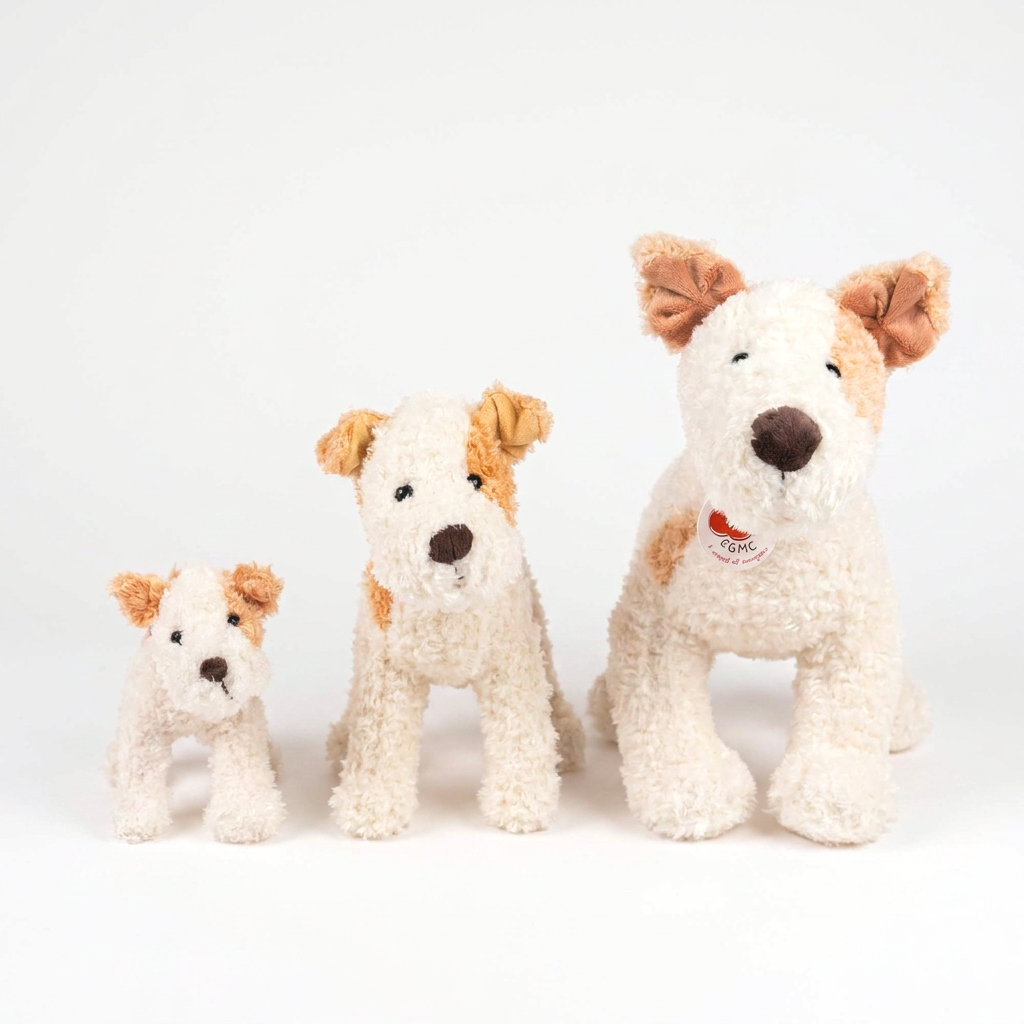 Egmont Plush Eliot Stuffed Dog set, cream and tan plush, three graduated sizes, front view.