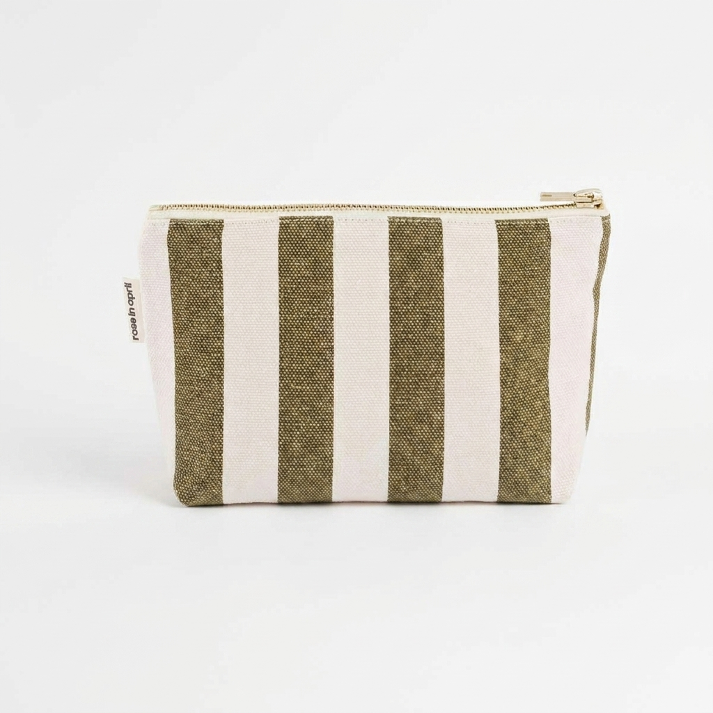 Rose in April Sofia Pouch - Stripes Olive / Greige studio product photo hanging from a wooden wall hook on a neutral…