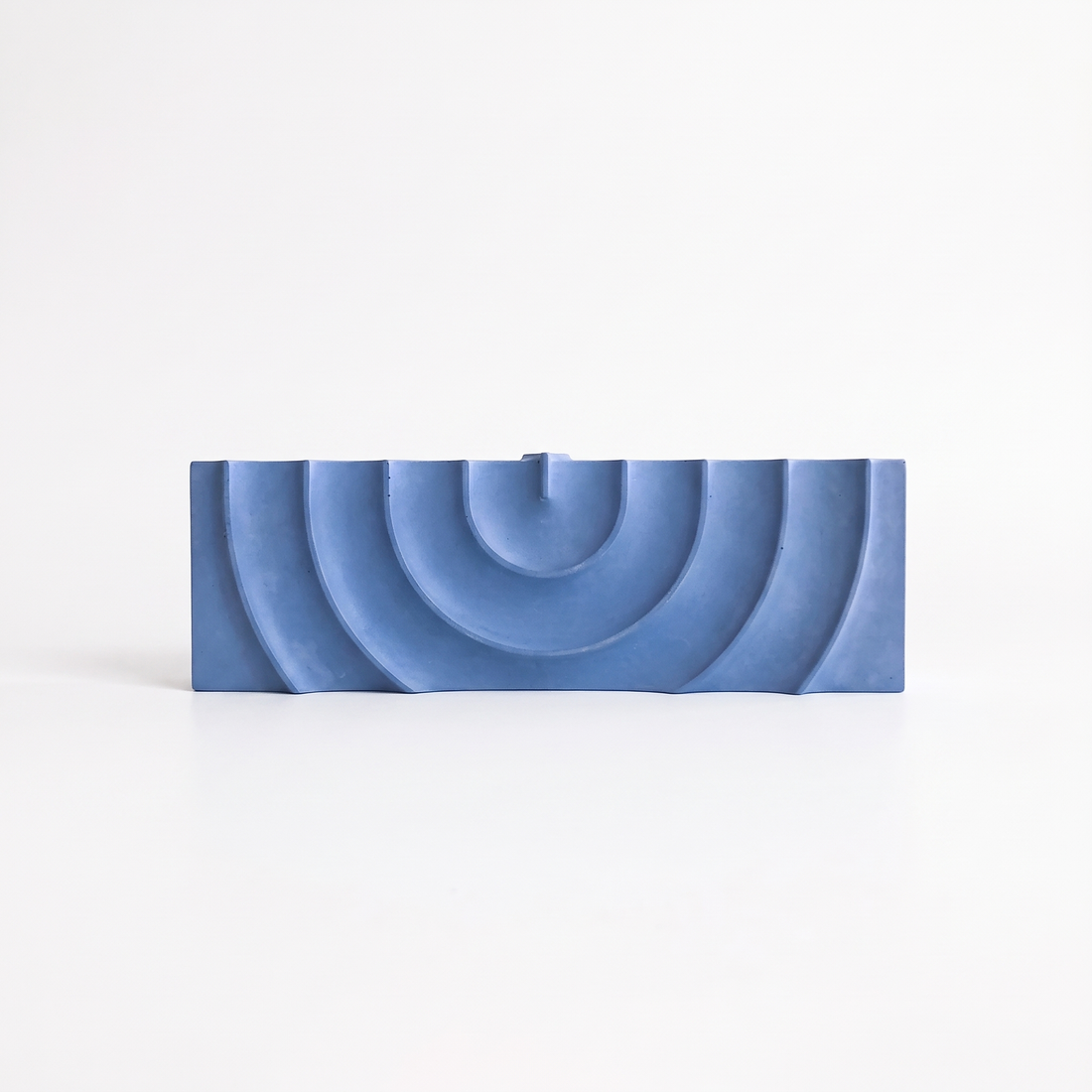 Logifaces Ripple Concrete Menorah studio product photo on a neutral off-white background