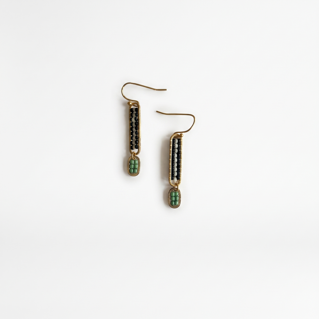 Stripe Beaded earrings pair, hand-stitched black, white, mint seed beads, gold-plated frames & ear wires, flat lay.