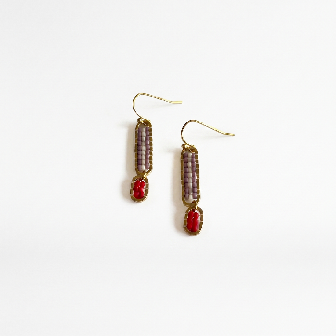 Stripe Beaded Earrings, mauve, white, and poppy red seed beads with gold-plated frames and ear wires, angled flat lay pair.