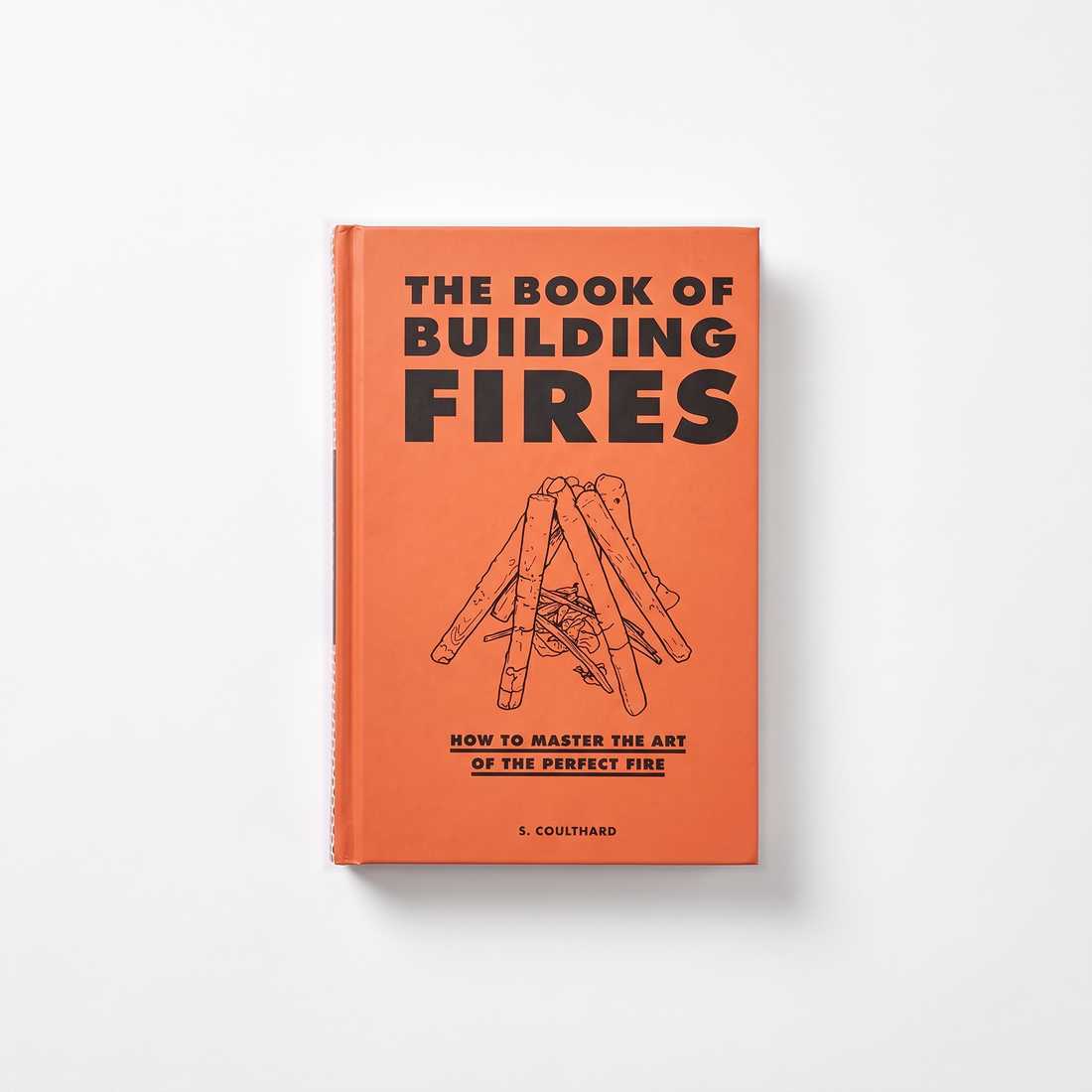 Chronicle Books The Book of Building Fires studio product photo on a neutral off-white background