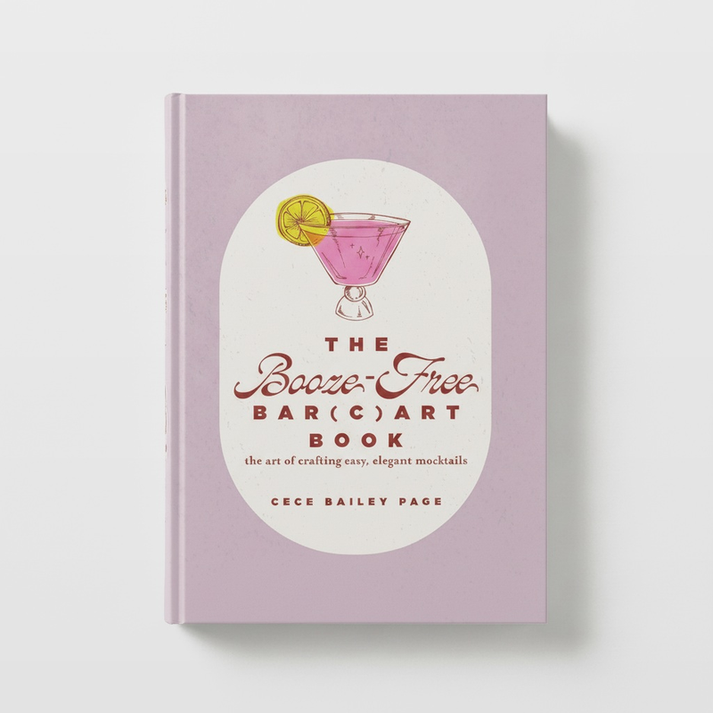 Schiffer Publishing The Booze-Free Bar(c)art Book, lavender cover with pink cocktail illustration, front view.