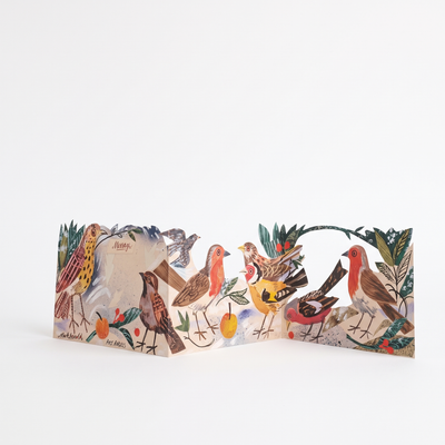 
                    
                      Art Angels Three Fold Winter Feast Die-Cut Card - Illustrated by Mark Hearld studio product photo on a neutral off-white background
                    
                  