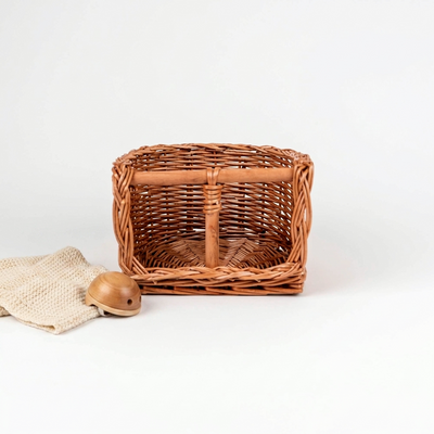 
                    
                      Egmont Wicker Bike Seat for Dolls, natural woven wicker, front view on white with a wooden toy and cloth for scale.
                    
                  