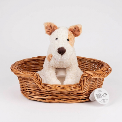 
                    
                      Wicker Dog Basket with Cushion, natural woven wicker, light cushion, with plush dog for scale, product tag visible.
                    
                  