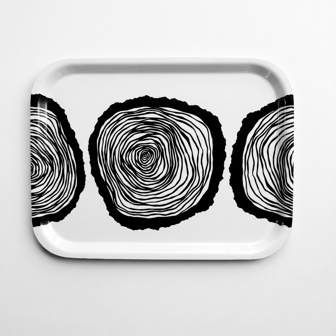 Anna Brones Wisdom Tray serving tray, black and white stylized tree ring illustration, front view on white.