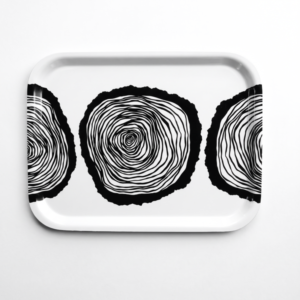 Anna Brones Wisdom Tray serving tray, black and white stylized tree ring illustration, front view on white.